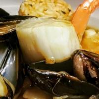 Seafood Stew · Seared Jumbo Shrimp, Scallop, PEI Mussles, Lump Crab Meat, Smoked Paprika Rice, Seafood Broth