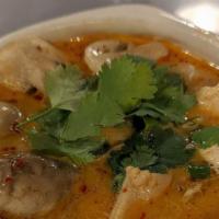 Tom-Kha-Gai (Coconut Milk Soup) · Spicy.  Chicken in coconut milk soup with galanga mushrooms,  lime juice,  chili, and herbs....