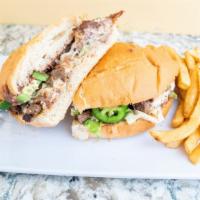 Torta Mexicana De Res · Mexican sandwich with steak with a protein, onions, refried beans, tomatoes, lettuce, avocad...