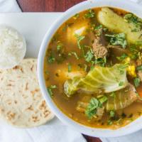 Sopa De Res · Beef soup, beef broth, mix of vegetable Latin style, served with a couple of tortillas on th...