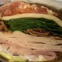 Club Sandwich · Thinly turkey and ham, bacon, avocado, mayo, tomato, baby spinach on multi-grain.