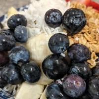 Acai · Organic acai sorbet topped with fresh seasonal fruit, granola nuts coconut.