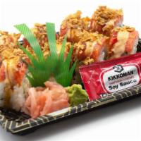 Red Dragon Roll · Avocado, crab, cucumber, topped with spicy tuna, fried onion, eel sauce, spicy sauce.