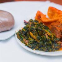 Amala, Vegetable Soup With Beef (Eran) · Yam flour is mixed in hot water to make hot Amala and served with vegetable soup and well co...