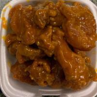 Honey Gold Boneless  Chicken Wings (10)  · Crispy Chicken Bites cover in our homemade tangy sweet sauce.
