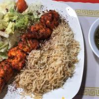 2 - Chalau Kabob · White rice served with meat sauce and your choice of either chicken, lamb, beef, or Shami ka...