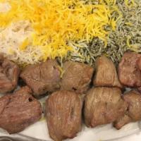 Lamb Shish Kabob · Juicy chunks of charbroiled tenderloin, served with grilled tomatoes.