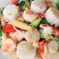 C 2. Seafood Delight · Lobster meat, shrimp & scallop sauteed w. fresh vegetables.