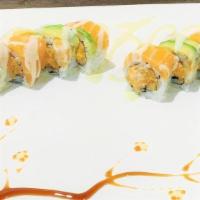  Salmon Lover Roll · Spicy salmon and crunchy inside, salmon and avocado on top with special sauce.
