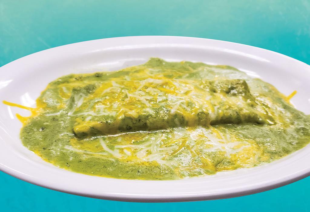 Enchilada · Corn tortilla with red or green homemade enchilada sauce & melted cheese.
