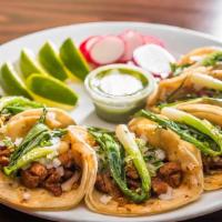Tacos · Tacos made with your choice of meat.