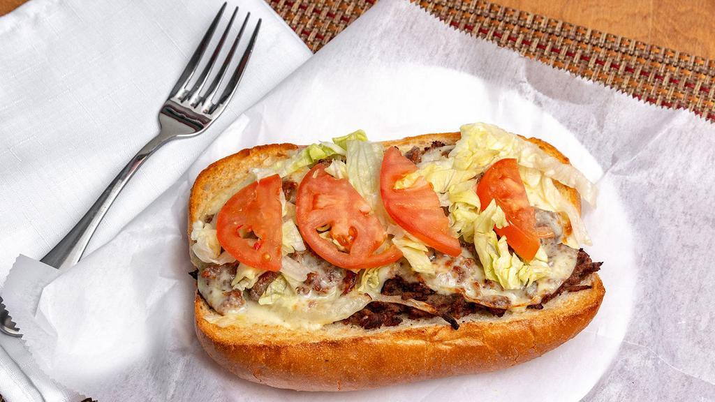 Cheese Steak · A whole cheesesteak sub with provolone cheese steak mayonnaise fried onion green peppers mushroom lettuce and tomatoes