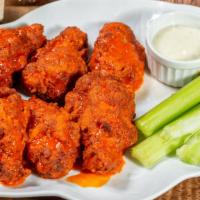 3) Buffalo Hot · Bone-in wings in Buffalo hot sauce served with celery or carrots and blue cheese or ranch