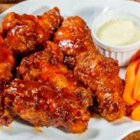 10) Mango Habanero · Bone-in wings in Mango habanero sauce served with celery or carrots and blue cheese or ranch