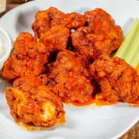 3) Buffalo Hot · Boneless wings in Buffalo hot sauce served with celery or carrots and blue cheese or ranch