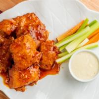 6) Sweet Chili · Boneless wings in sweet Chili sauce served with celery or carrots and blue cheese or ranch