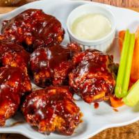 9) Honey Bbq · Boneless wings in honey BBQ sauce served with celery or carrots and blue cheese or ranch