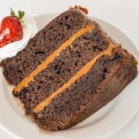 Chocolate Cake · Moist chocolate cake filled with dulce de leche covered with chocolate ganache.