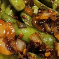 Spicy Edamame · Steamed soy beans with spicy sauce.