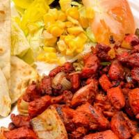 Chicken Gyro Platter · Homemade chicken with lettuce tomato, and onions and white sauce