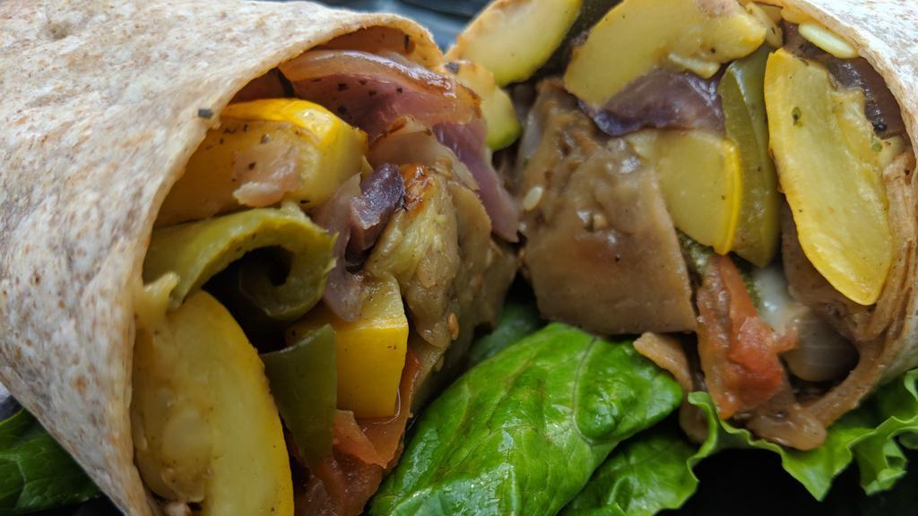Grilled Veggie Wrap · Zucchini, Squash, Tomato, Red Onion and Mushrooms Grilled to Perfection and Topped with Melted Provolone Cheese in a Warm Tortilla Wrap.