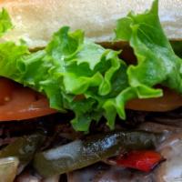 Steak & Cheese Sub · Sliced Sirloin Steak Grilled Hot & Topped with Onions, Peppers, Mushrooms, Provolone Cheese,...