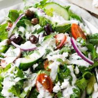 Greek Salad · Mixed greens, grape tomatoes, onions, cucumbers, black olives, pepperoncini and feta