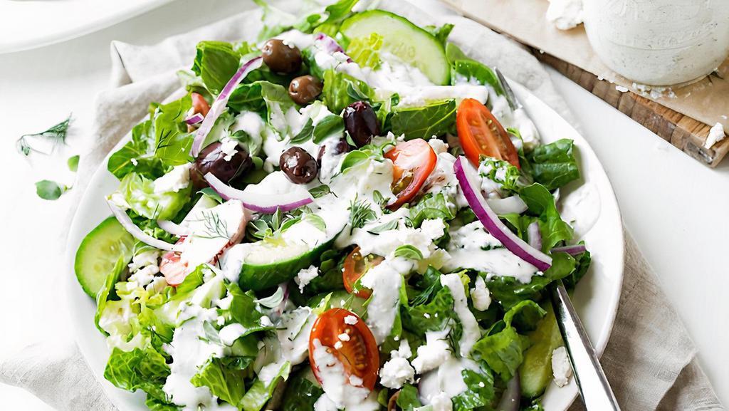 Greek Salad · Mixed greens, grape tomatoes, onions, cucumbers, black olives, pepperoncini and feta