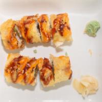 Vegas Roll · Salmon, cream cheese, and avocado topped with spicy mayo and eel sauce.