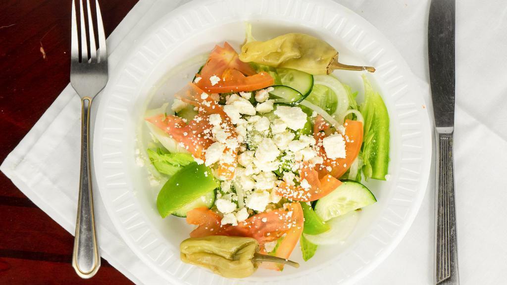 Greek Salad · Comes with lettuce, tomato, onion, green peppers, cucumber's, green olives, pepperoncini and feta cheese