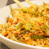 Burnt Garlic Chili Fried Rice · Spicy. Gluten free. Prepared with aromatic basmati rice. Golden fried garlic and crushed dry...