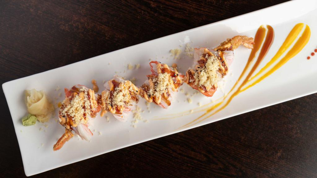 Angel Roll · Strip tempura, mango inside top w. spicy crab meat.