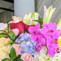 Designer Choice · Designer choice  flowers incuding roses ,lilies, hydreans and peoines. and more.