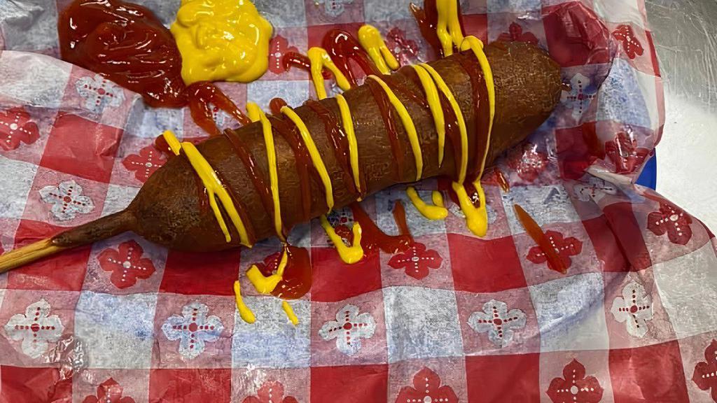 Corn Dog · Our large 1/4 pound weiner dipped in a classic cornmeal batter and deep fried to a crispy golden brown.