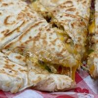 Chicken Quesadilla · Grilled chicken in our special spice blend combined with grilled green peppers and onions. S...