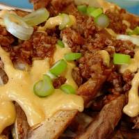 Chili Cheese Fries · A large order of our fresh hand-cut fries smothered with our home made chili and nacho cheese.