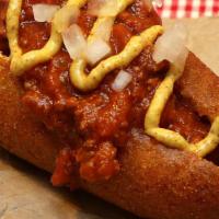 Chili Cheese Corndog · Our 1/4 pound hot dog dipped in cornmeal batter, deep fried, then split and filled with our ...