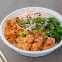 Spicy Ahi · Spicy. Ahi tuna, creamy spicy sauce, green onion, tobiko, furikake, seaweed salad, krab salad.