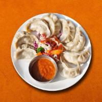 Steamed Veg Dumplings  · Classic steamed, lightly seasoned vegetable dumplings