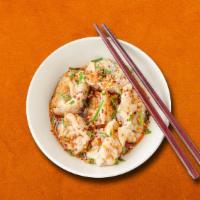 Wok Tossed Chicken Dumplings · Chicken dumplings wok tossed with chili sauce, onions  and bell peppers