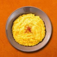 Zaffrani Pulao  · Long grain aromatic basmati rice lightly tempered with saffron