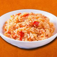 Tomato Rice  · Long grain aromatic basmati rice stirfried with tangy tomato chutney