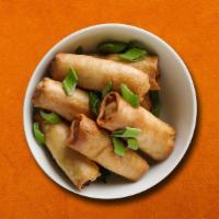 Veggie Spring Roll  · Golden fried crispy spring rolls served with sweet chili sauce