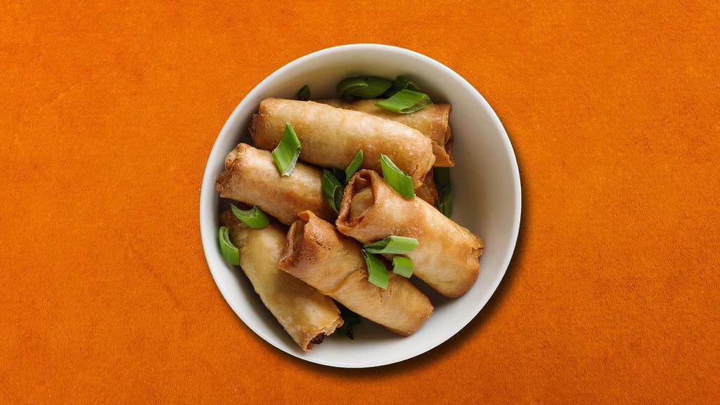 Veggie Spring Roll  · Golden fried crispy spring rolls served with sweet chili sauce
