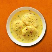 Rasmalai · Our house made village cheese fritters steeped in  rich condensed milk with crushed pistachi...