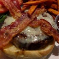 Texas Bbq Burger · Hickory flavored barbecue sauce, bacon and Swiss cheese. Meats are cooked to customer's requ...