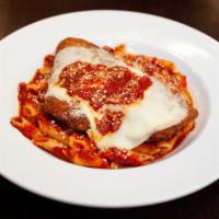 Chicken Parmesan · Tender breaded chicken cutlet topped with provolone cheese and our own marinara sauce. Serve...