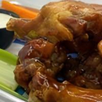 Awc 10 Bone-In Wings · 10 bone in wings crispy fried then tossed in your choice of one of our signature awc sauces....