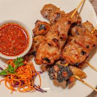 Moo Yang/Gai Yang · Five skewers. Our house famous grilled marinated pork or chicken on a skewer with special ho...