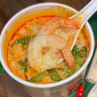 Creamy Tom Yum Goong Soup · Well-known spicy lemongrass, galangal soup with shrimp, and mushroom in a creamy broth.